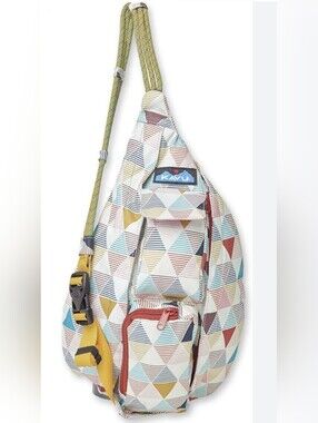KAVU TRIBLINDS ROPE SLING BAG WITH A COLORFUL GEOMETRIC PRINT.
